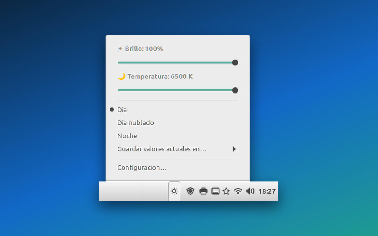 Menú del applet Brillo en el panel de Cinnamon: sliders de brillo y temperatura, y la lista de modos Día, Día nublado y Noche.